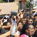 Students form varies higher tertiary institutes protesting in front of parliament during the Budget Mid-Term speech - Cape Town 